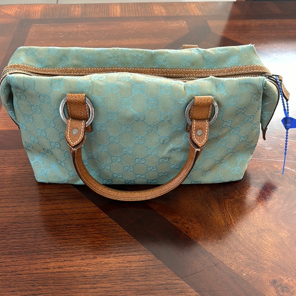 Gucci Blue Bag with Durable Canvas Material and Stylish Leather Handles